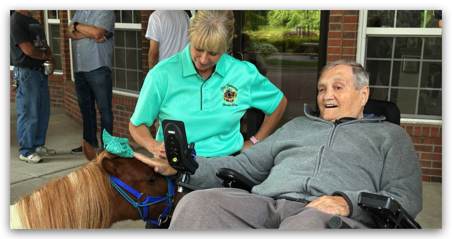 Heather, horse, and man in wheelchair